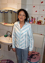 Mature Slut Caught Changing Clothes In The Bathroom