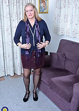 British Mature Lady Playing On The Couch