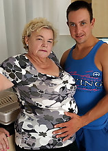 Curvy Granny Having Fun With Her Toy Boy In The Kitchen